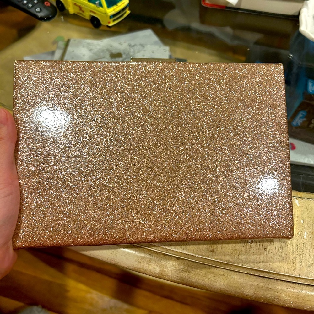 Kate Spade rose gold clutch